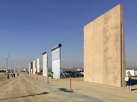 Border wall prototypes on display in San Diego, where contractors offer different designs.